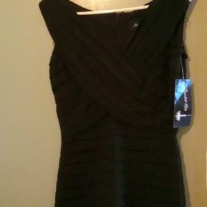 Scarlett nite, size 6 very stretchy, tiered layers of fabric, never been worn.